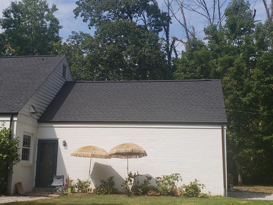 Modern house with dark shingles