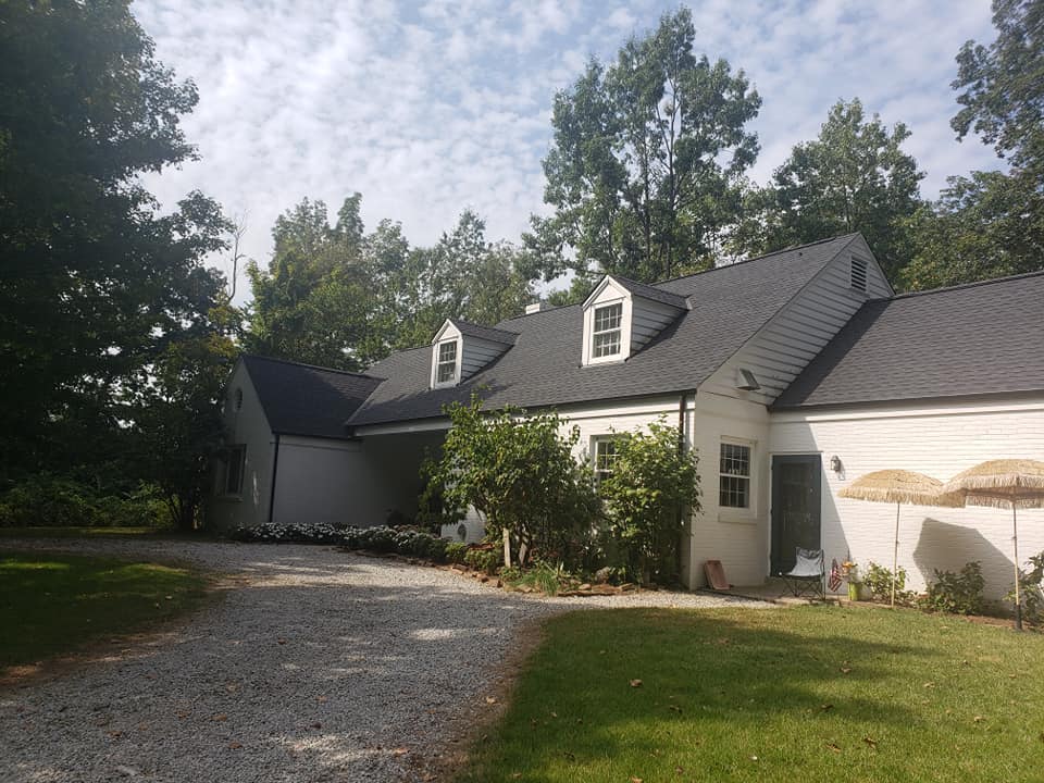 House with dark colored roof