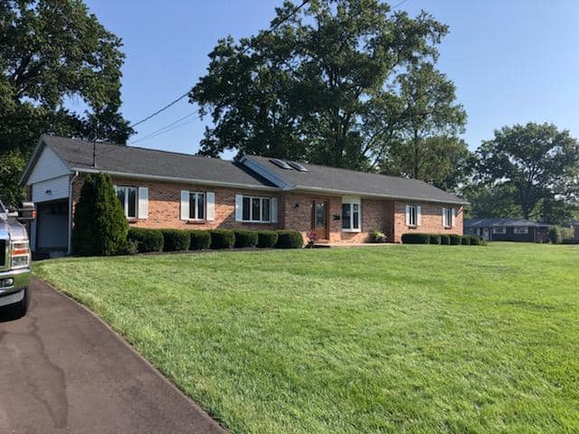 House with green lawn