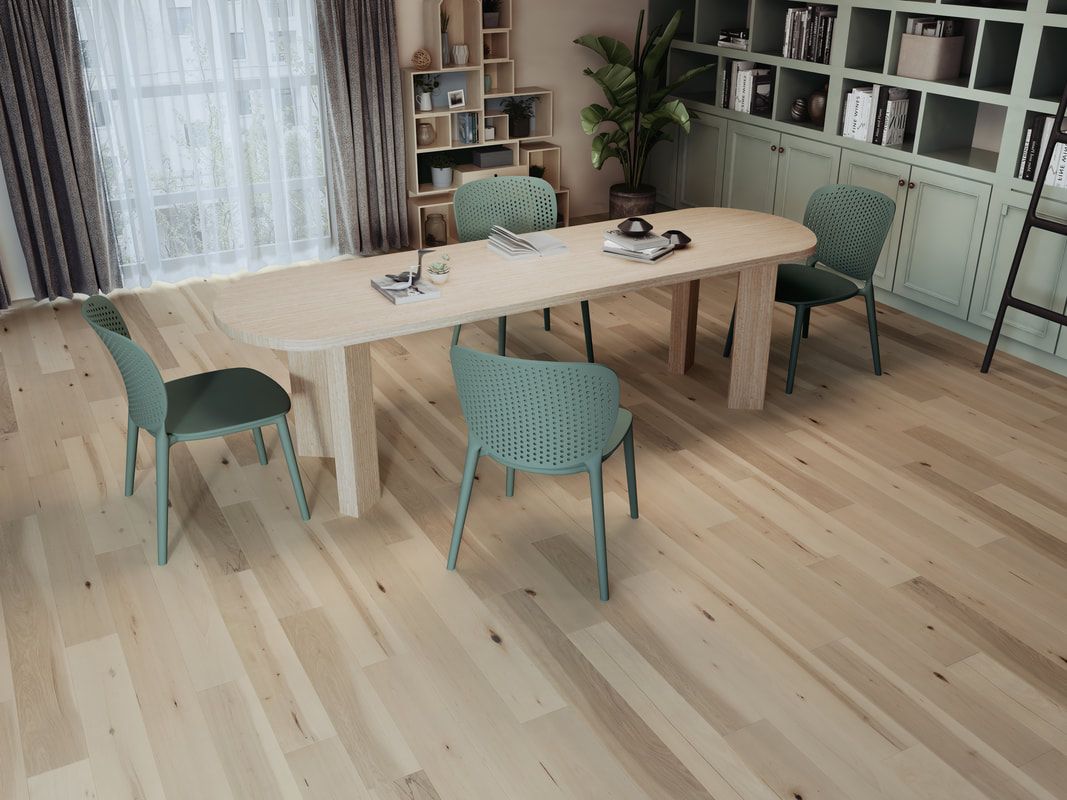A living room with a wooden table and chairs.
