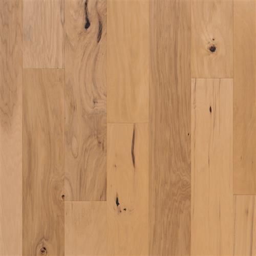 A close up of a wooden floor with a grain and texture.