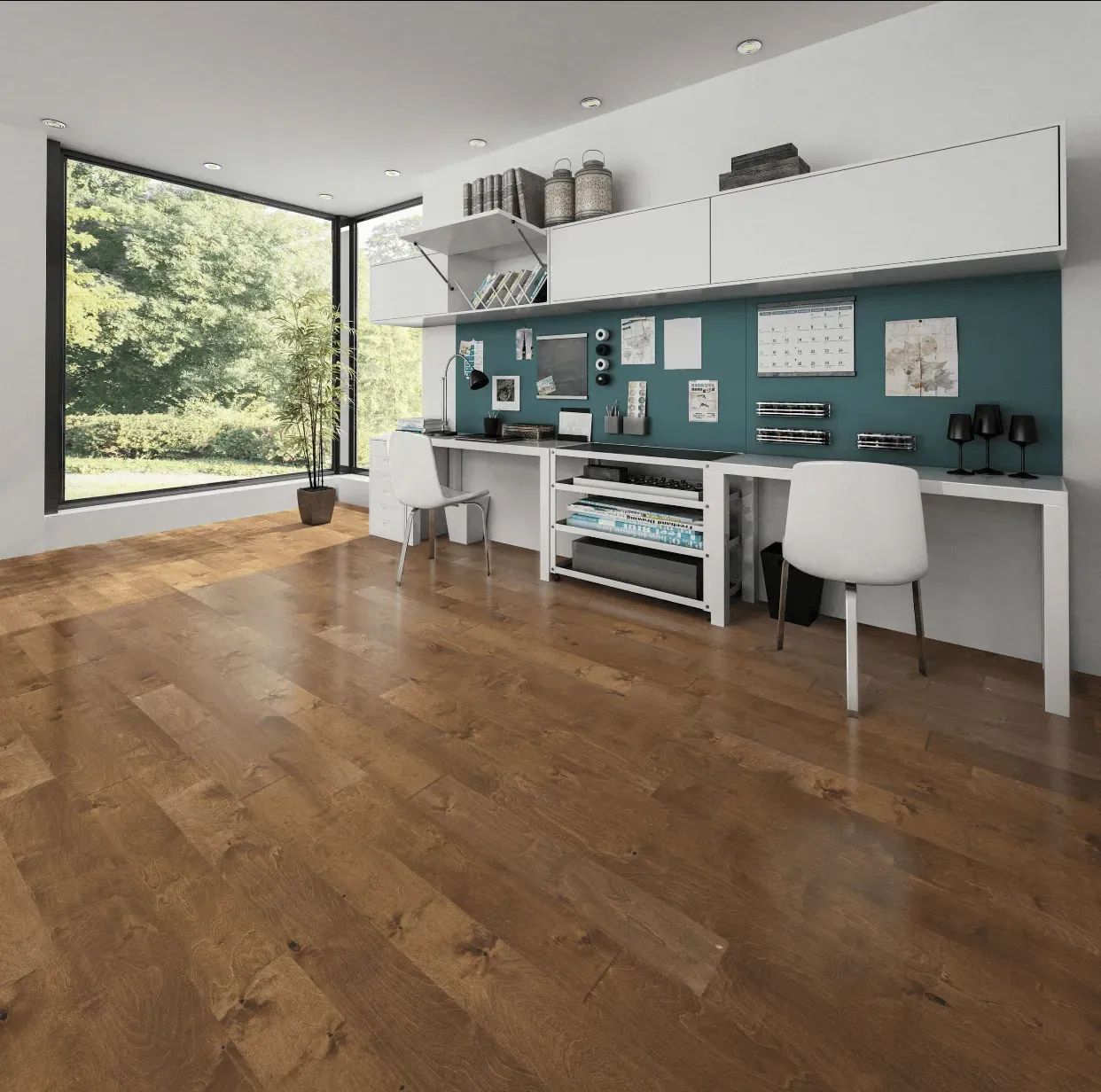 A room with hardwood floors , a desk , chairs and a large window.