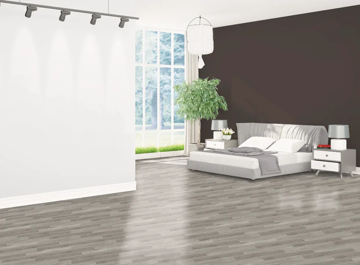 A bedroom with a bed , nightstands , lamps and a large window.