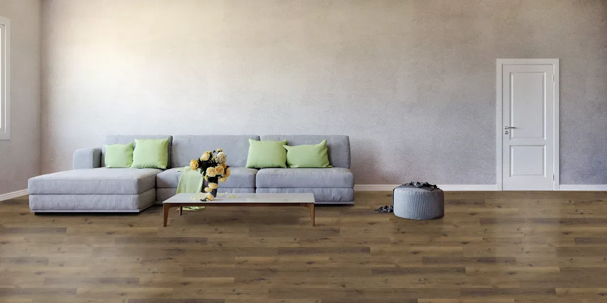 A living room with a couch , coffee table , and door.