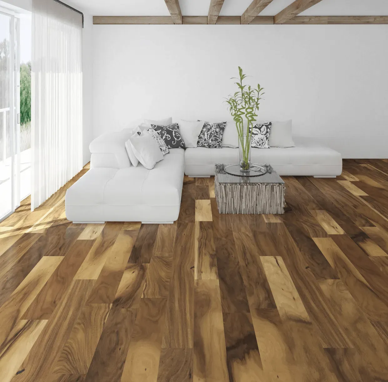 A living room with hardwood floors and a white couch