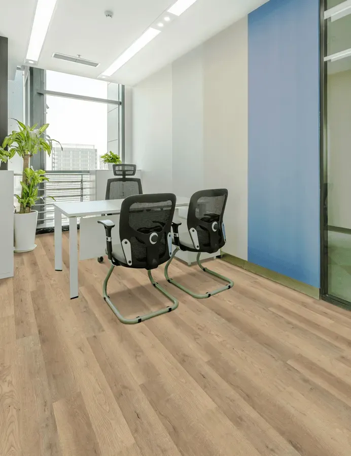 There are two chairs and a table in the room.