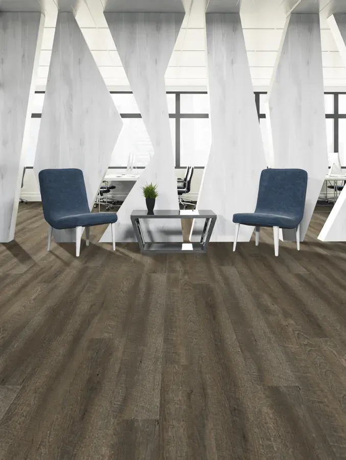 There are two chairs and a table in the room.