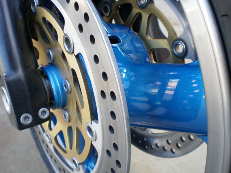 A close up of a motorcycle brake disc