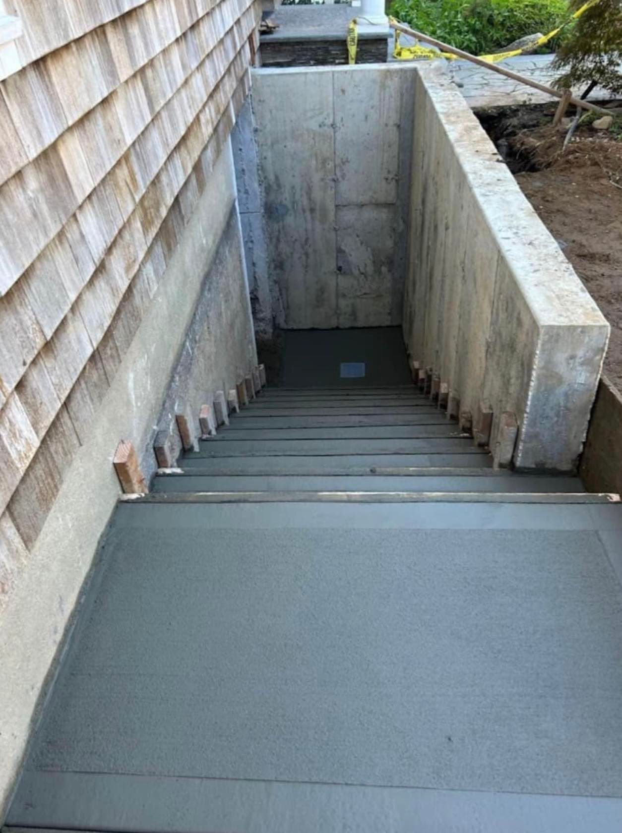 A set of stairs leading up to a basement