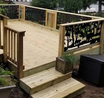 A wooden deck with stairs leading up to it