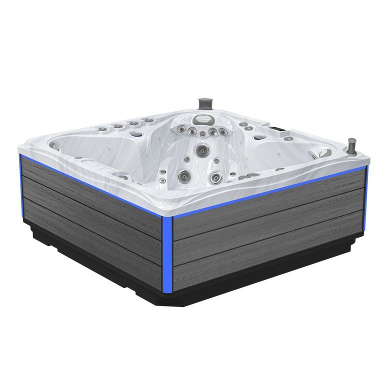 Corner hot tub with gray wood-look siding, white shell, and blue LED accent lighting