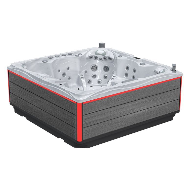 Gray outdoor hot tub with red trim and built-in jets, shown in three-quarter view
