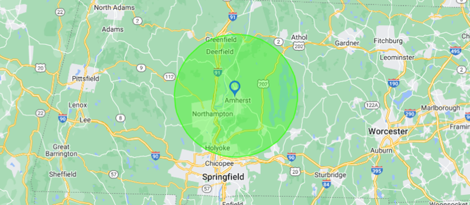 a map of a city with a green circle around it