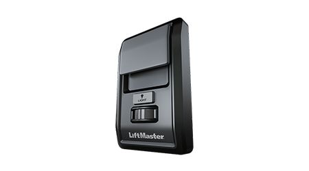 Black LiftMaster garage door opener remote. Button and sliding cover visible.