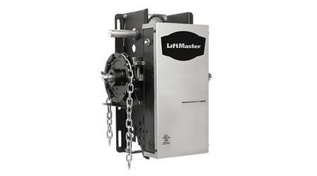 LiftMaster commercial garage door opener, mounted on a bracket, with a chain drive.