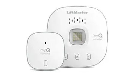 Two white LiftMaster myQ garage door opener devices. One is square, one is round.