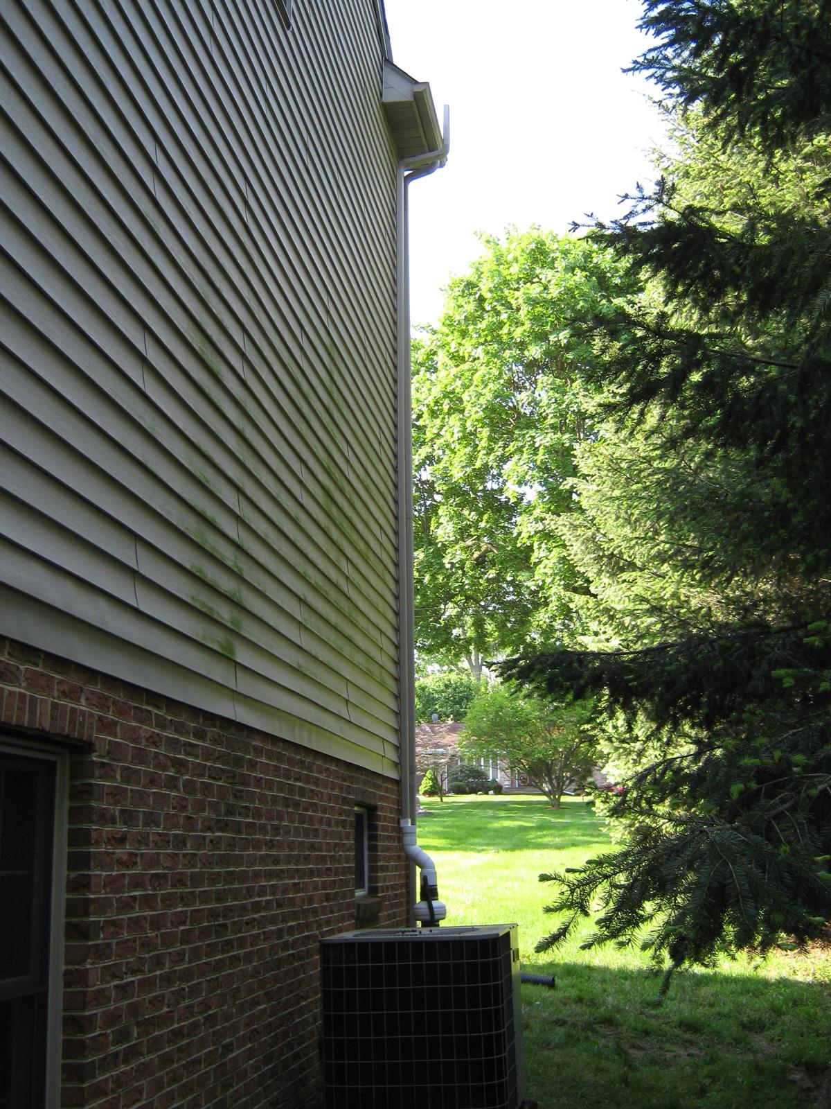Radon mitigation product installed and HVAC unit
