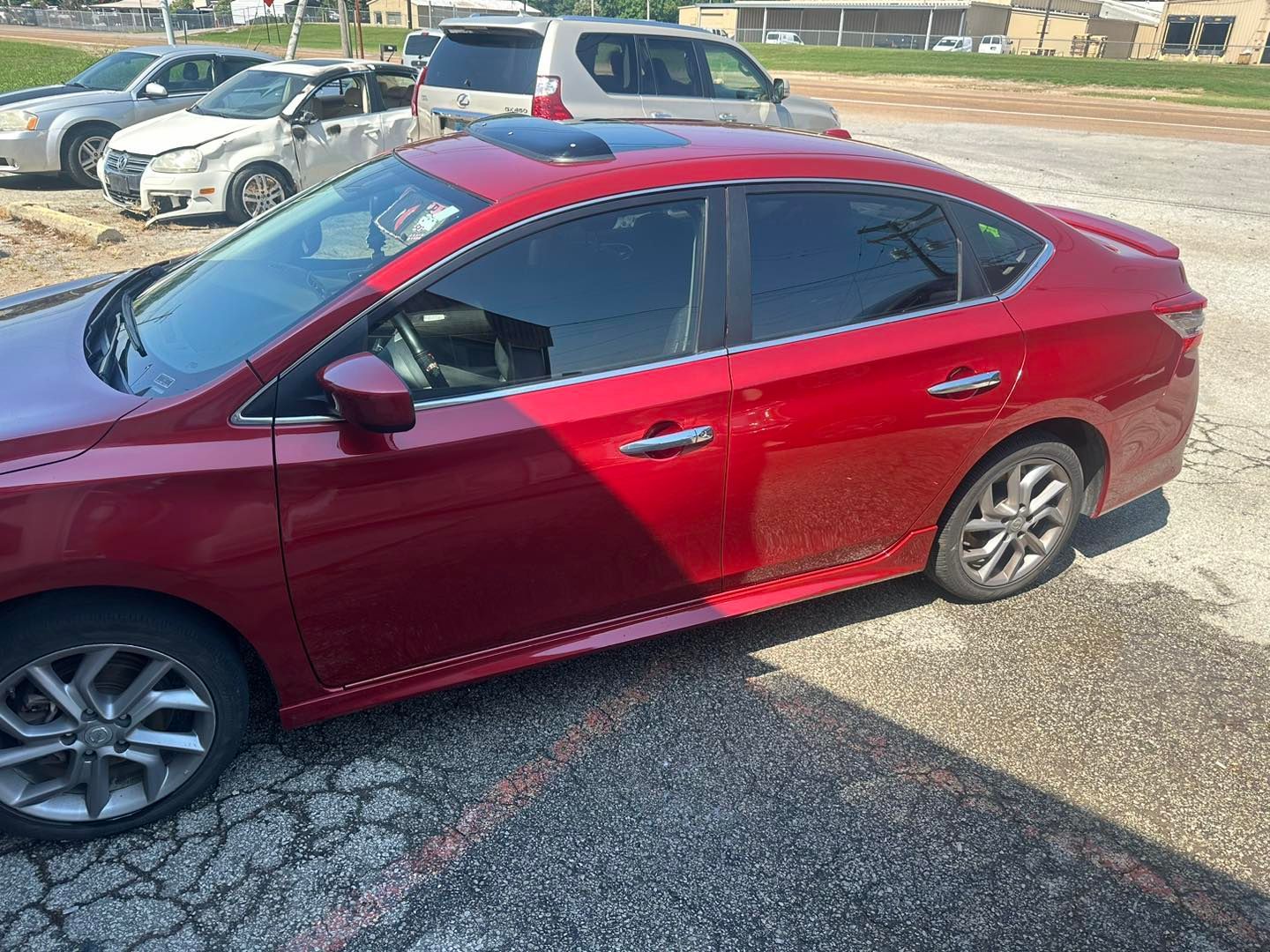 red sedan after repair