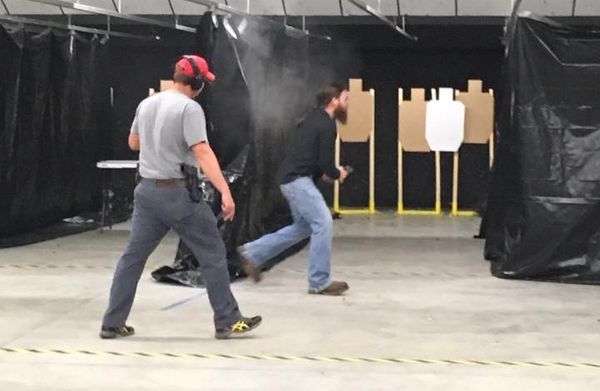Two men in shooting range