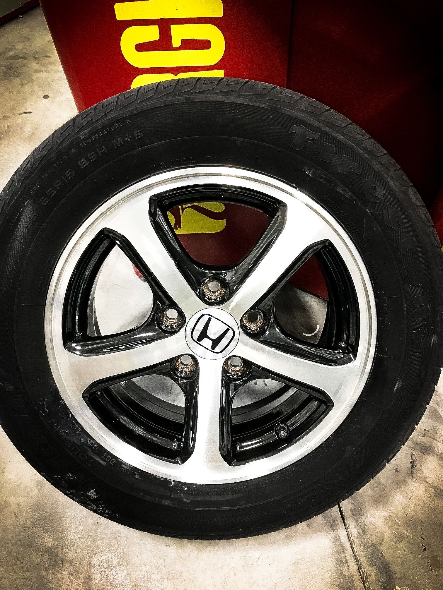 A close up of a tire with a honda logo on it