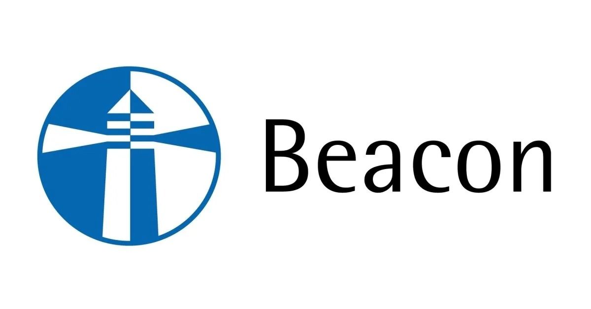Blue circular logo featuring a stylized lighthouse design next to the text 
