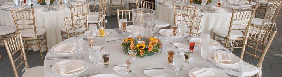 White table and gold chairs setting.