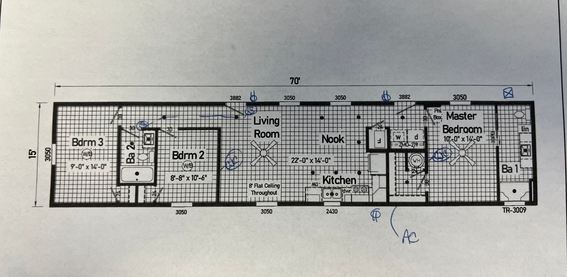 Floor plan of a rectangular house with master bedroom, kitchen, living room, and two other rooms.