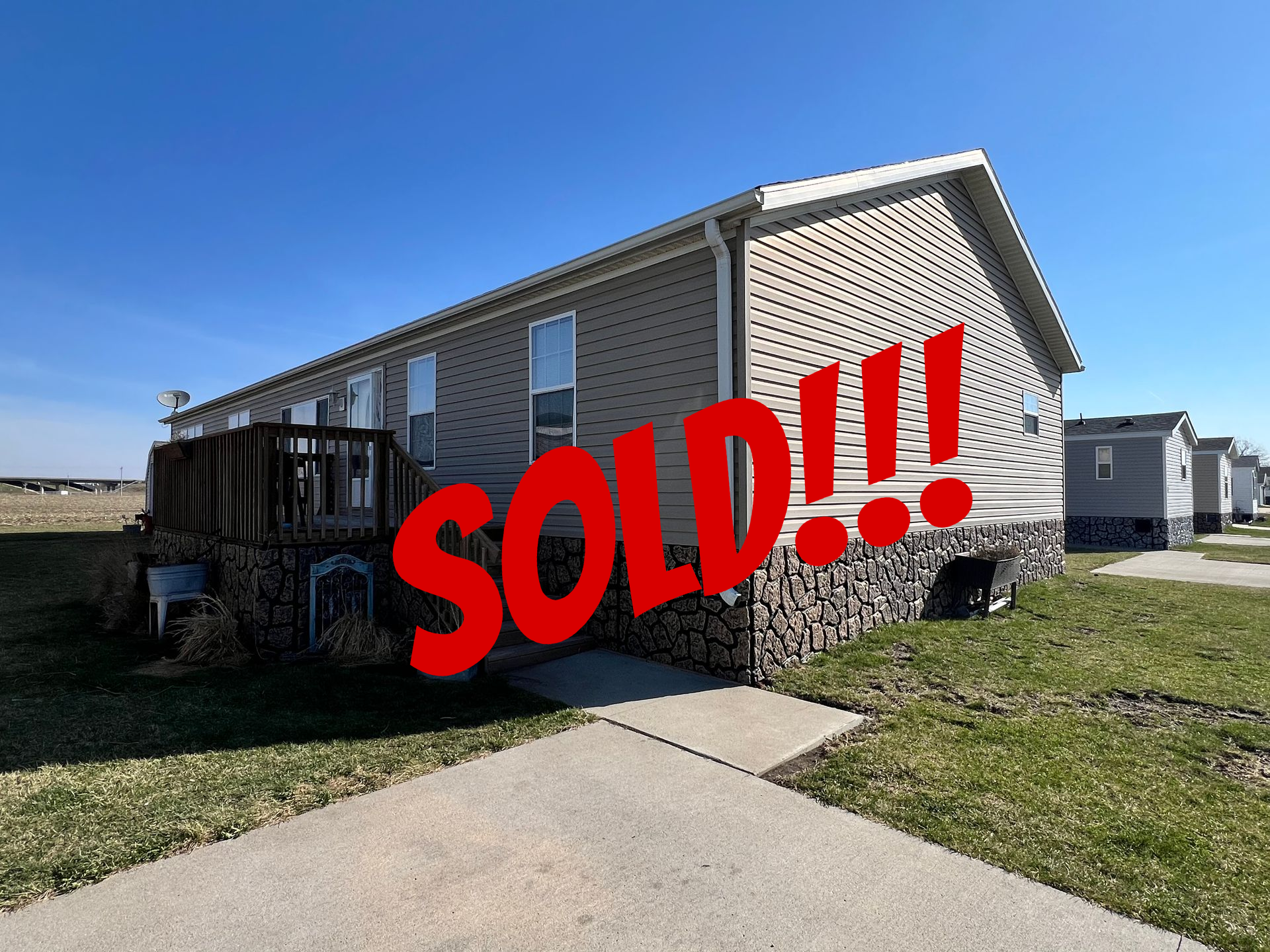 Floor plan of a house with labels for kitchen, bedrooms, living room, and bathrooms.