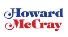 The howard mcgray logo is blue and red on a white background.