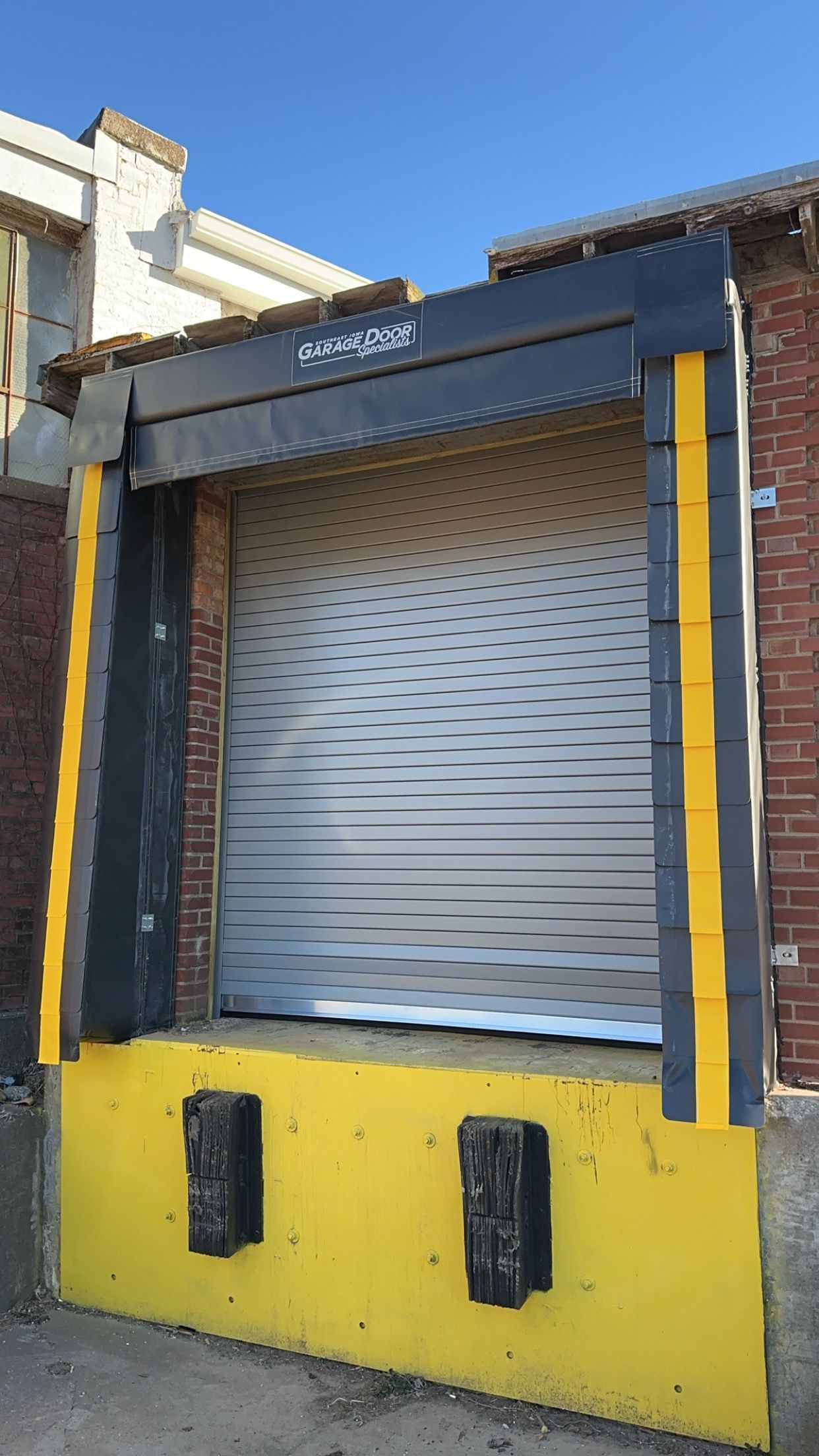 A yellow and black dock with a sliding door