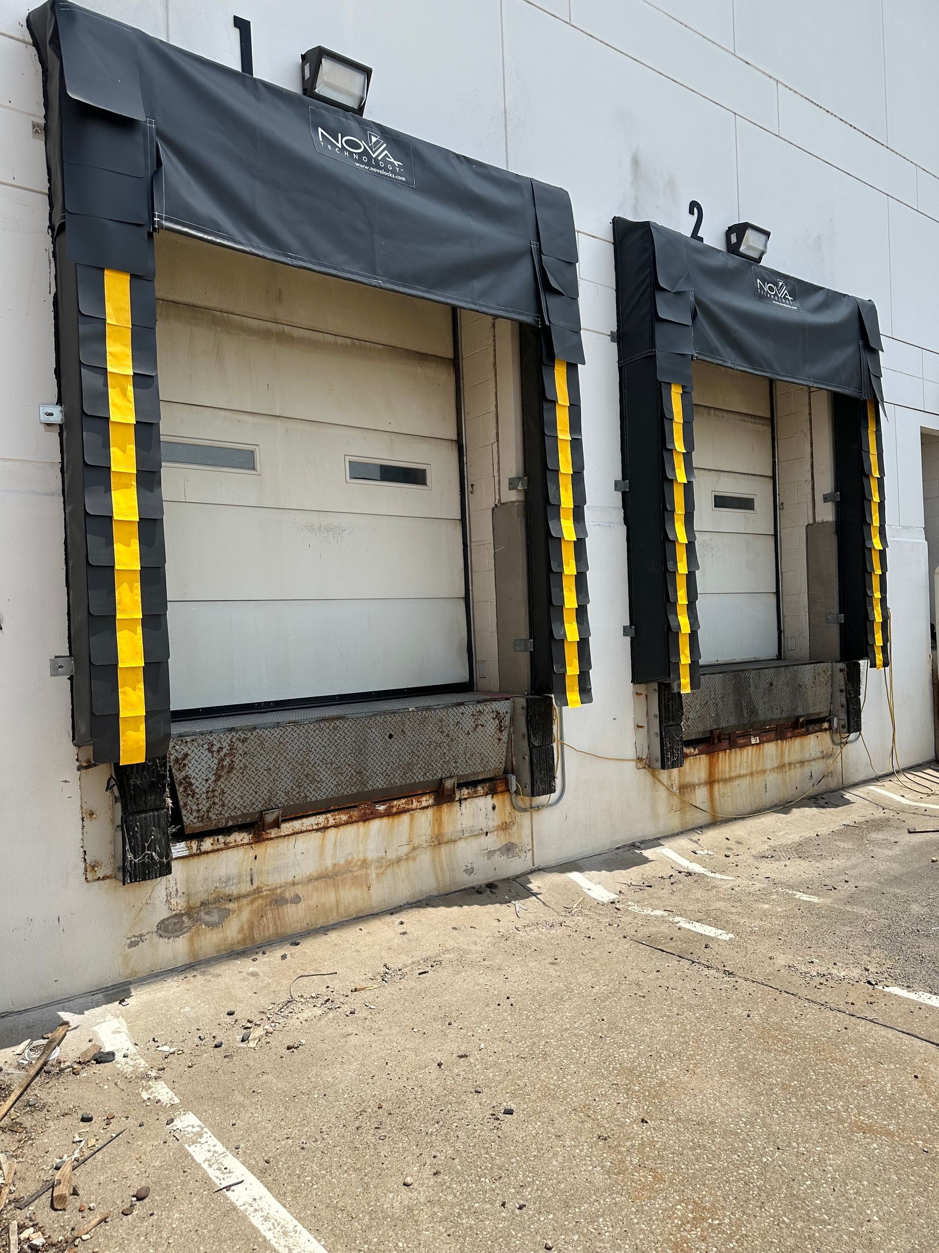 A row of loading docks on the side of a building