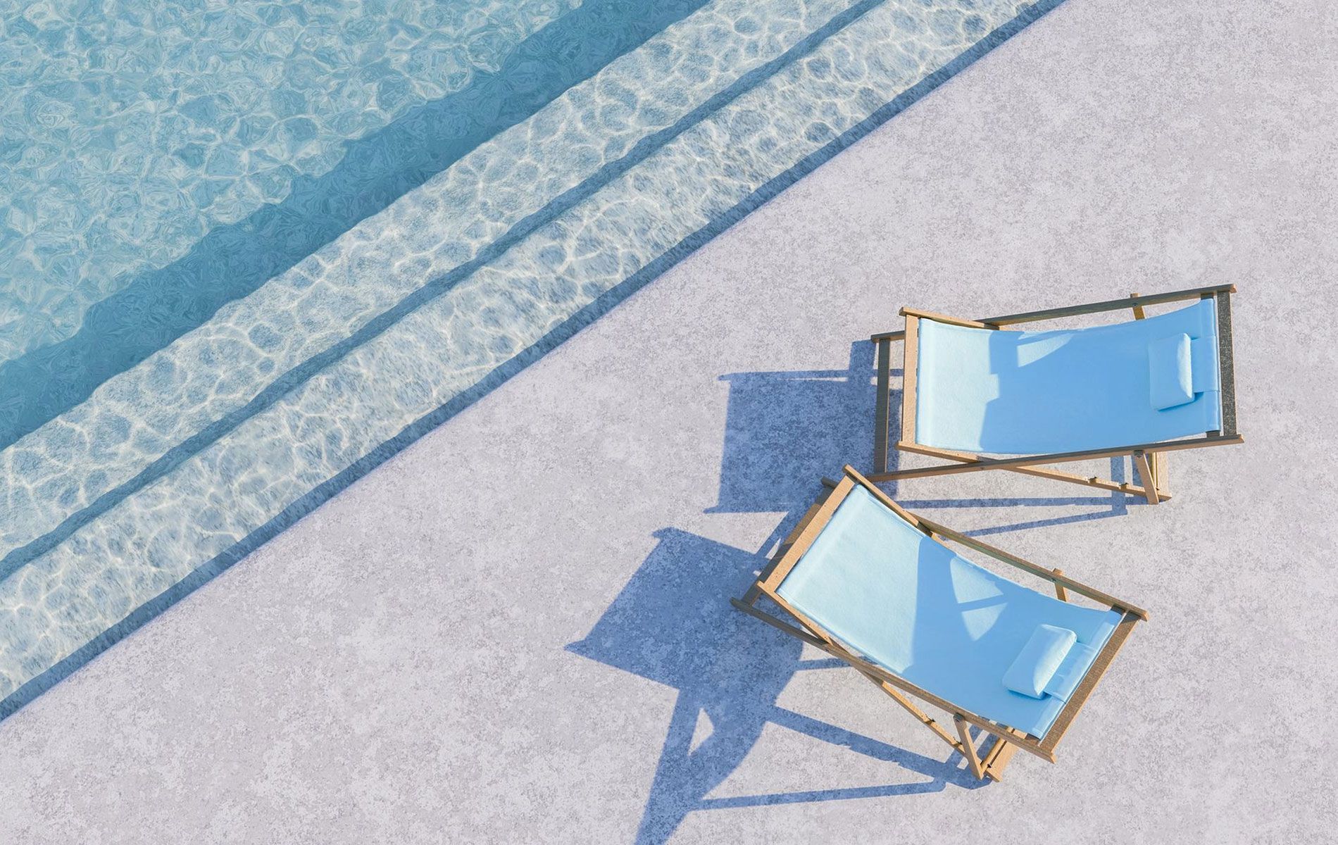 Poolside scene with two light blue lounge chairs casting shadows, next to a pool.