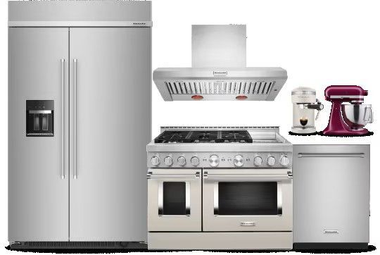 A kitchen with a refrigerator , stove , dishwasher , and mixer.