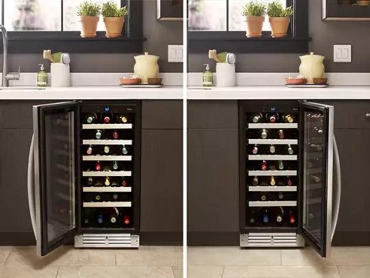 A wine cooler in a kitchen with the door open and closed.