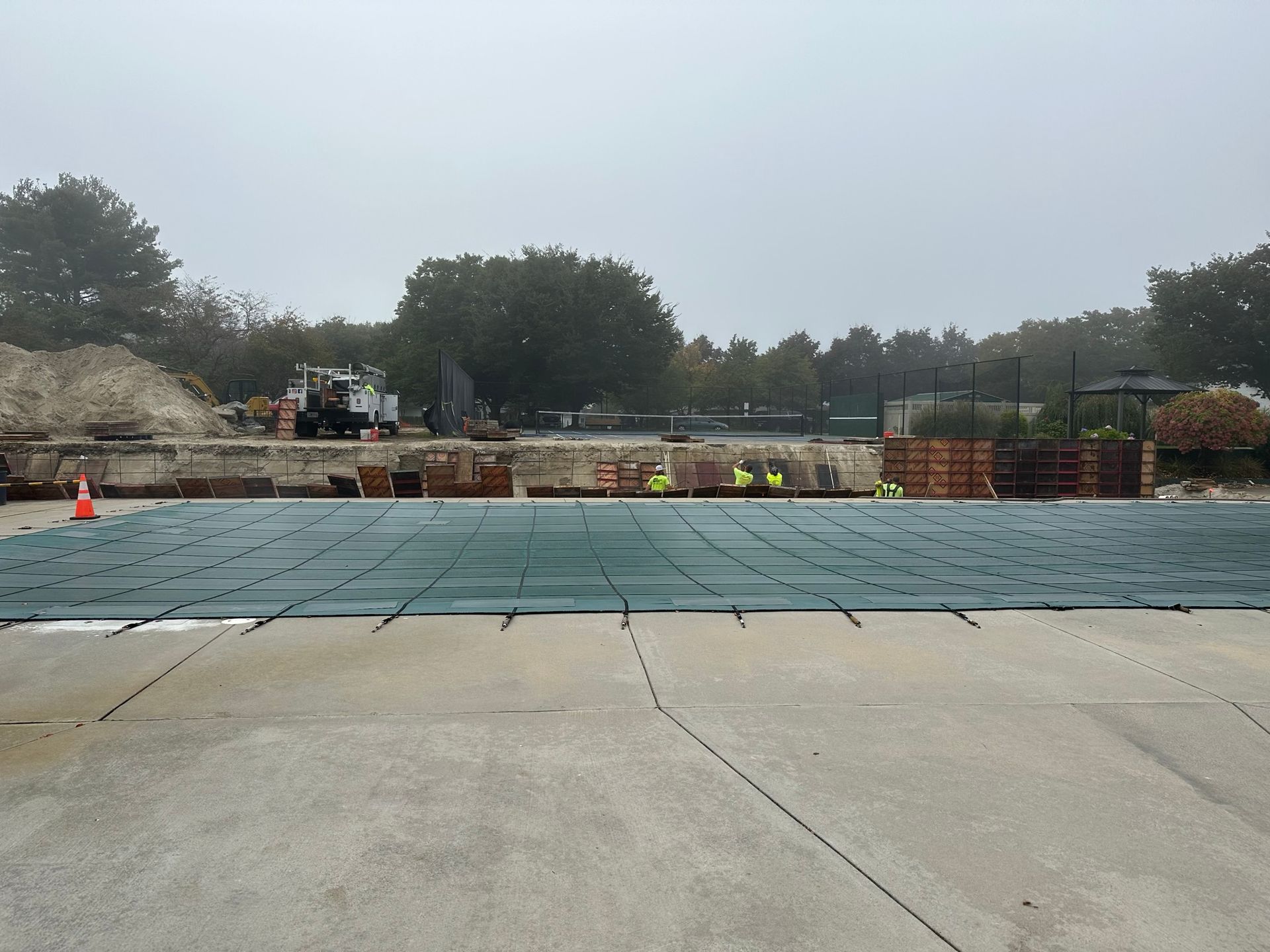 Failing retainer wall removal and replacement