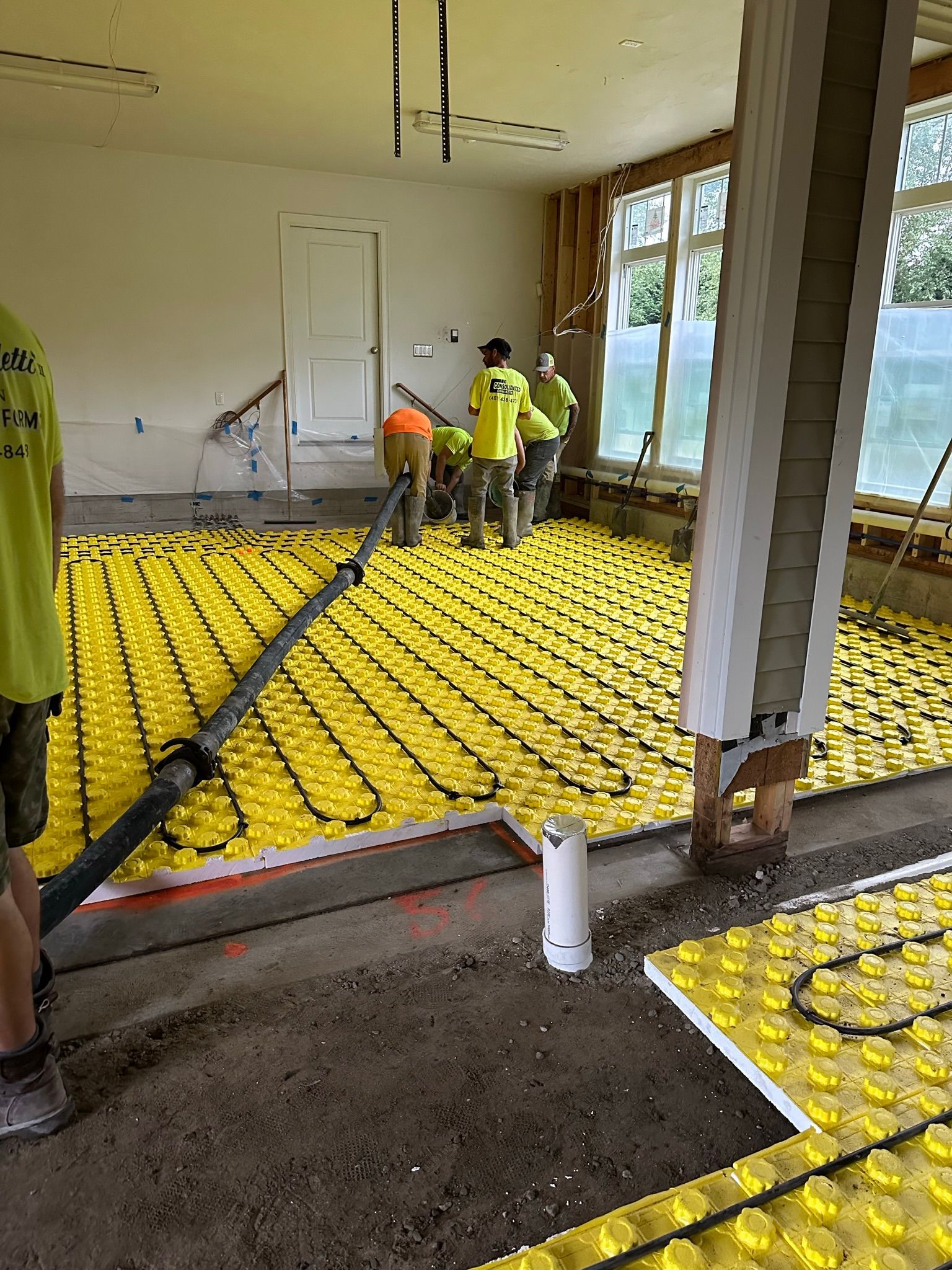 Concrete slab over radiant heat tubes