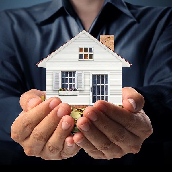 Holding a house figure