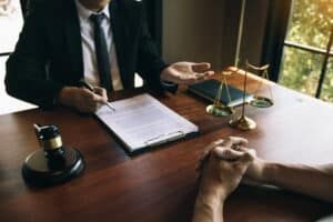 A lawyer talking to a client about employment discrimination