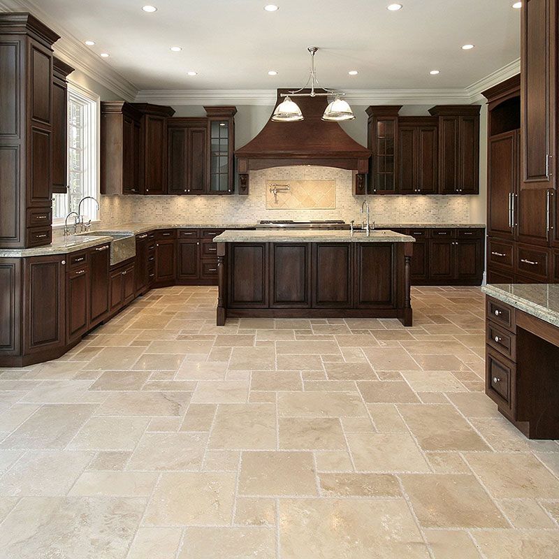 a kitchen with a large island in the middle
