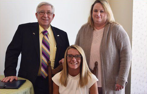 Douglas C. Lehman with staffs