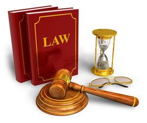 Book of law, Hour glass, gavel and a sunglass