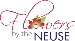 Logo reading &ldquo;Flowers by the Neuse&rdquo; in red, green, and purple floral script