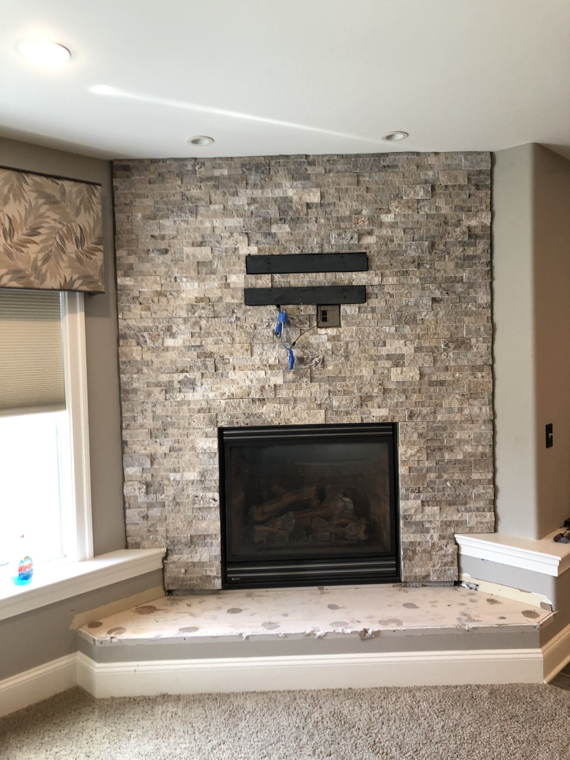 fireplace with brick wall
