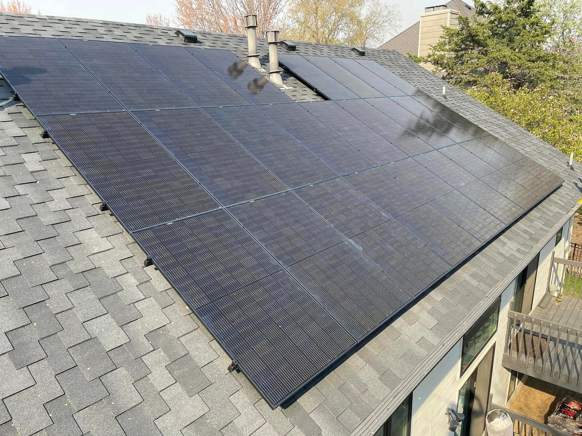 A roof with a lot of solar panels on it