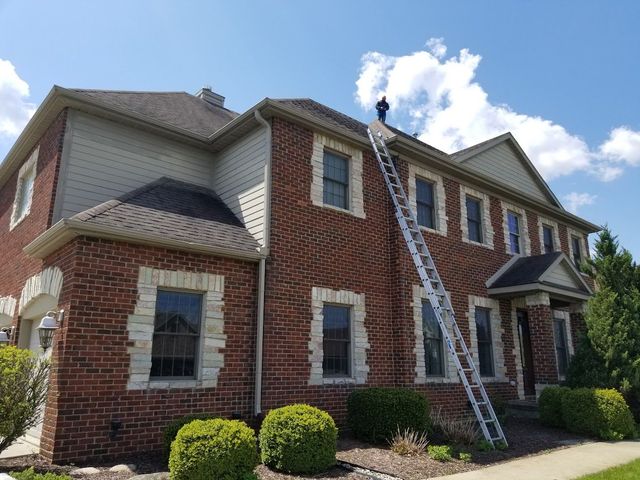 Repairman fixing the roof