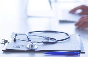 Stethoscope over medical prescription