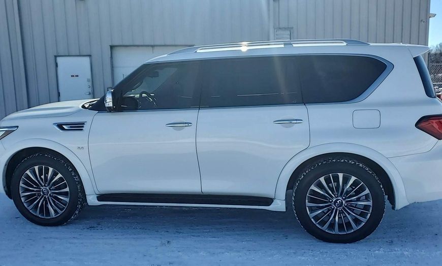 Auto window tinting service