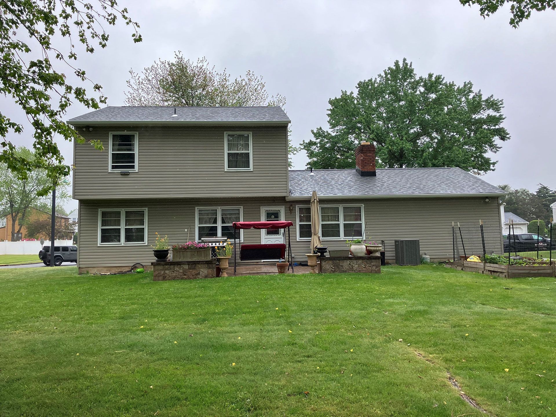 A large house with a large lawn in front of it