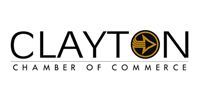 Clayton Chamber of Commerce logo: Black text with a gold arrow emblem inside a circle.