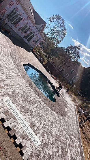 men at work on a pool deck